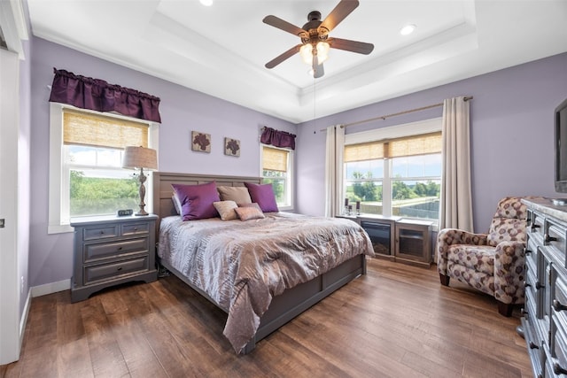 605 Alexis Ln, Marion, IA 52302 - bedroom with a tray ceiling, dark wood finished floors, recessed lighting, a ceiling fan, and ornamental molding