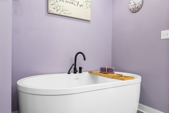 605 Alexis Ln, Marion, IA 52302 - bathroom with a soaking tub