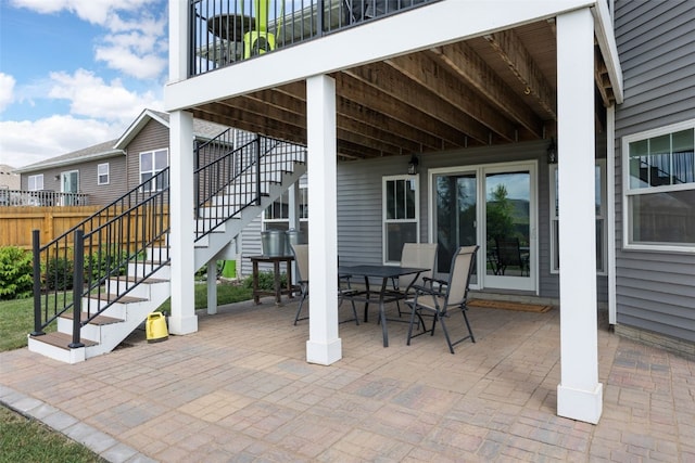 605 Alexis Ln, Marion, IA 52302 - view of patio / terrace with stairs and outdoor dining area