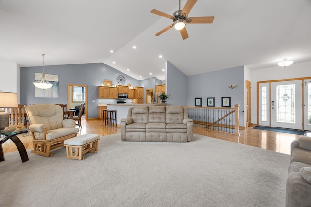 6845 Flint Rock Ct, Marion, IA 52302 - living area with recessed lighting, light carpet, a ceiling fan, and high vaulted ceiling