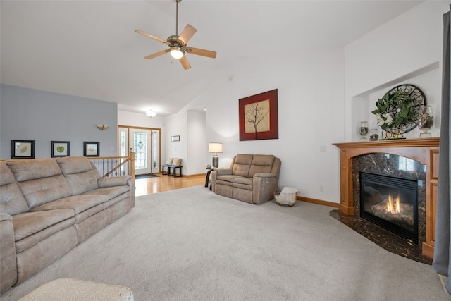 6845 Flint Rock Ct, Marion, IA 52302 - living room with carpet flooring, a ceiling fan, high vaulted ceiling, and a fireplace