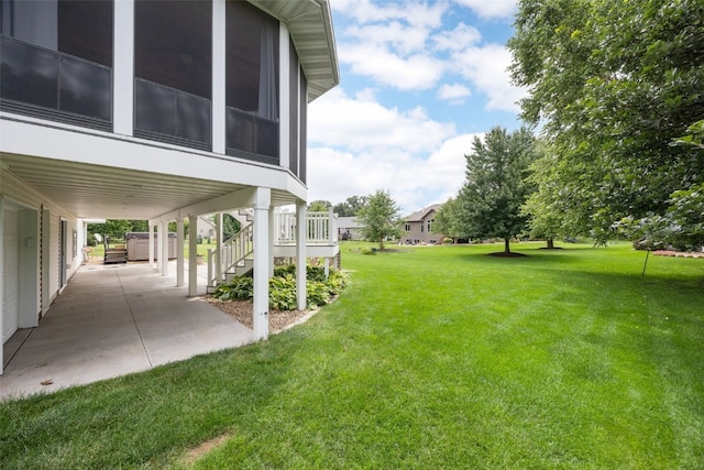 6845 Flint Rock Ct, Marion, IA 52302 - view of green lawn with a patio area and stairs