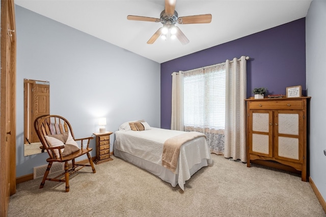 6845 Flint Rock Ct, Marion, IA 52302 - bedroom with light colored carpet and ceiling fan