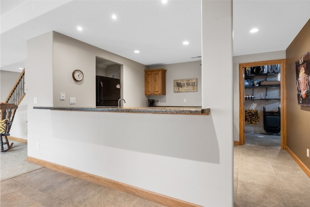 6845 Flint Rock Ct, Marion, IA 52302 - kitchen featuring fridge, recessed lighting, and light tile patterned floors