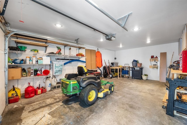 6845 Flint Rock Ct, Marion, IA 52302 - garage with a garage door opener and a workshop area