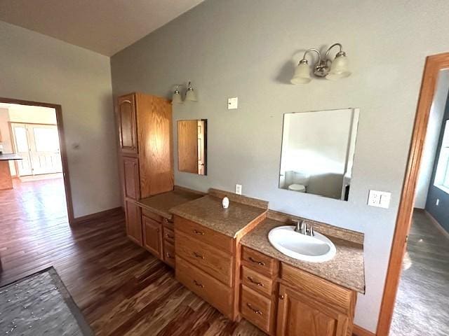 832 E Main St, Central City, IA 52214 - bathroom with wood finished floors and lofted ceiling