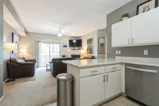 3028 Center Point Rd NE Unit 201, Cedar Rapids, IA 52402 - kitchen with dishwasher, open floor plan, light countertops, and a peninsula