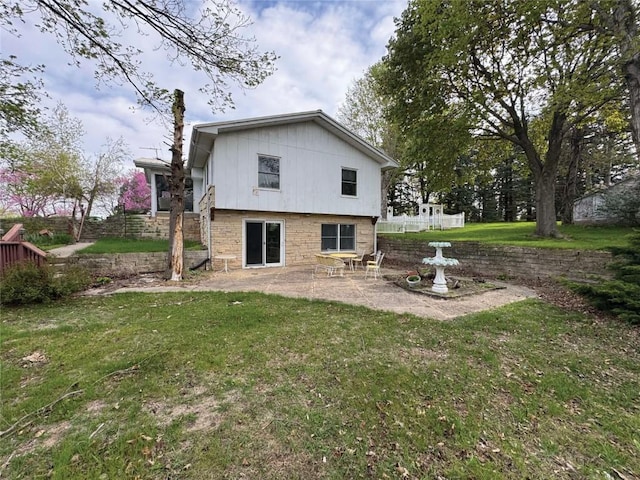 1852 215th St, Manchester, IA 52057 - back of house with a patio