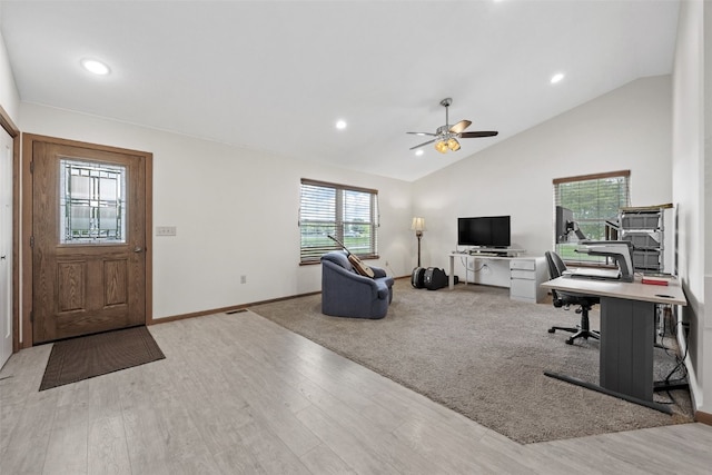 2089 117th Ct, Kalona, IA 52247 - living room with wood finished floors, vaulted ceiling, a desk, recessed lighting, and ceiling fan