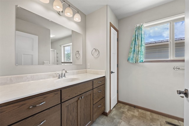 2089 117th Ct, Kalona, IA 52247 - bathroom with baseboards and vanity