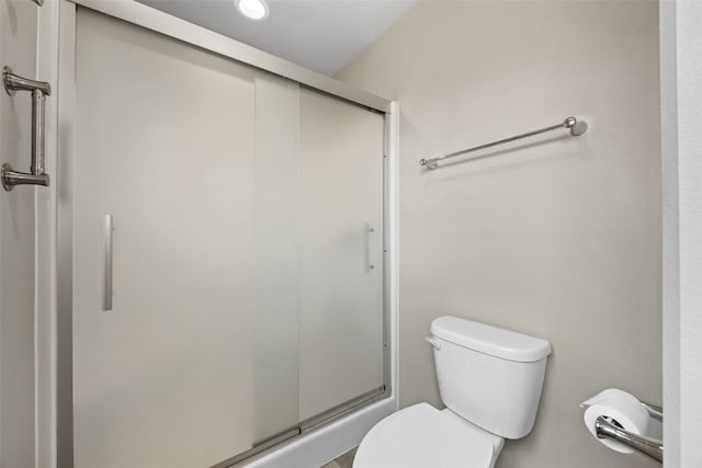 2089 117th Ct, Kalona, IA 52247 - full bathroom with a shower stall and toilet