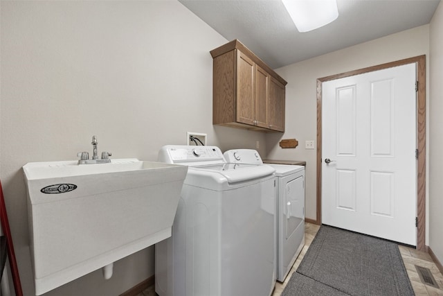 2089 117th Ct, Kalona, IA 52247 - washroom with cabinet space and washing machine and dryer