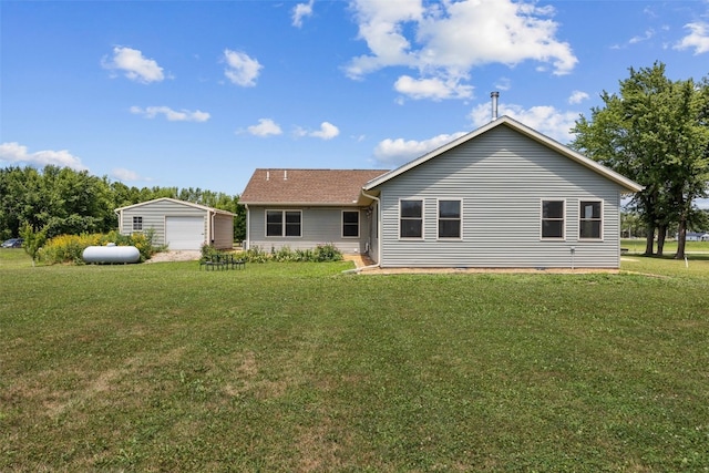 2089 117th Ct, Kalona, IA 52247 - single story home featuring a detached garage, a front lawn, and an outdoor structure
