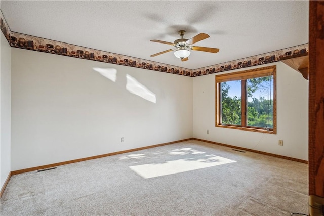 5524 Cimarron Ct, Marion, IA 52302 - carpeted spare room featuring ceiling fan and a textured ceiling