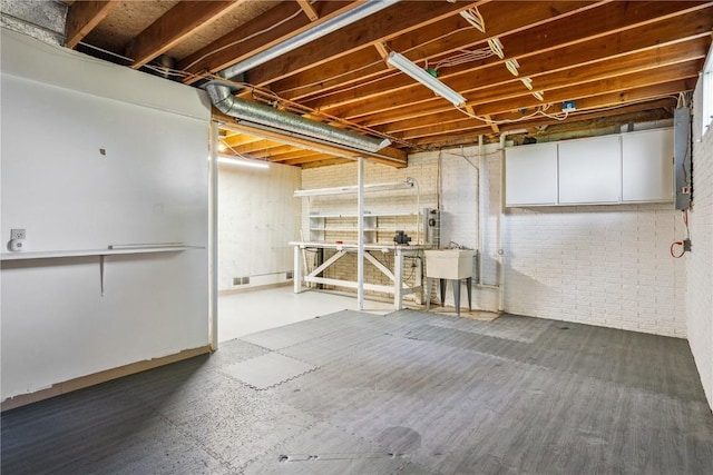 5524 Cimarron Ct, Marion, IA 52302 - unfinished basement with electric panel and brick wall