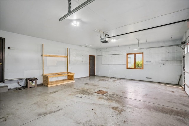 5524 Cimarron Ct, Marion, IA 52302 - garage featuring a garage door opener