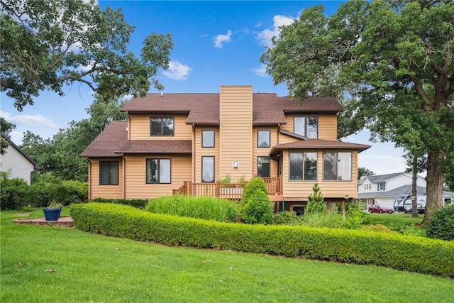 5524 Cimarron Ct, Marion, IA 52302 - back of house with a yard, a chimney, and roof with shingles