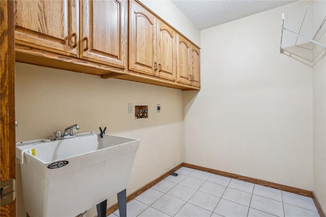 5524 Cimarron Ct, Marion, IA 52302 - laundry room with cabinet space, washer hookup, and electric dryer hookup