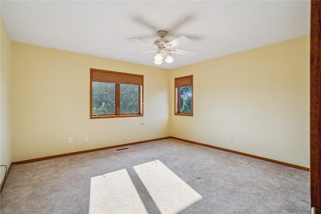 5524 Cimarron Ct, Marion, IA 52302 - carpeted spare room with ceiling fan and baseboards