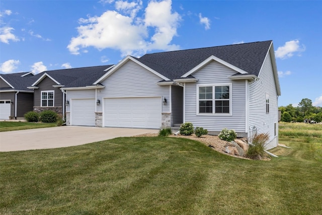 1921 Bowstring Dr, Marion, IA 52302 - view of front of home featuring an attached garage, driveway, a front yard, and roof with shingles