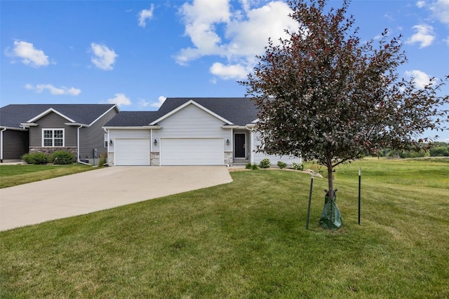 1921 Bowstring Dr, Marion, IA 52302 - view of front of home with an attached garage, driveway, a front lawn, and stone siding