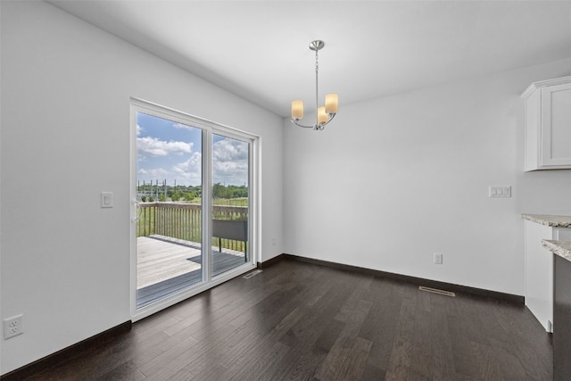 1921 Bowstring Dr, Marion, IA 52302 - unfurnished dining area featuring dark wood finished floors and a chandelier