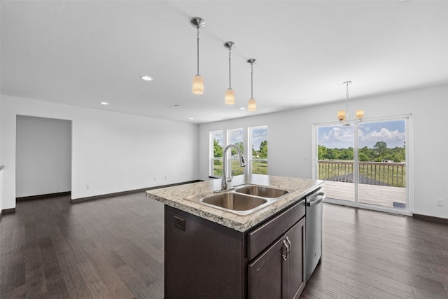 1921 Bowstring Dr, Marion, IA 52302 - kitchen with stainless steel dishwasher, dark brown cabinetry, light countertops, dark wood finished floors, and recessed lighting