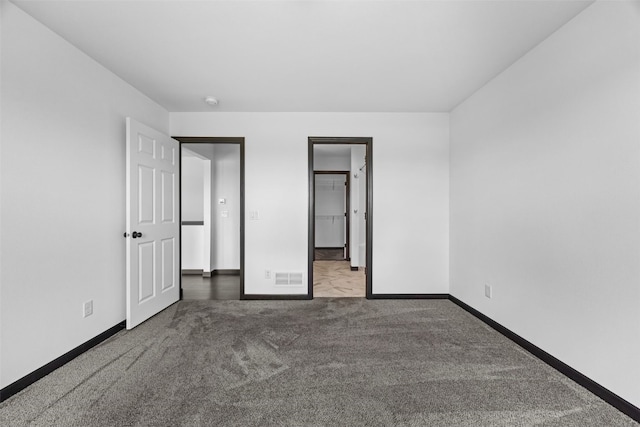 1921 Bowstring Dr, Marion, IA 52302 - unfurnished bedroom with carpet flooring and baseboards
