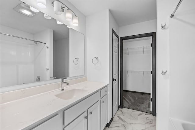 1921 Bowstring Dr, Marion, IA 52302 - full bath featuring marble finish flooring, vanity, bathtub / shower combination, and a spacious closet