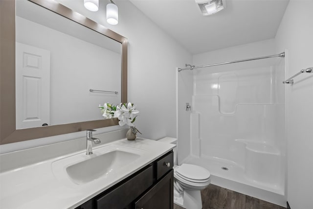 1921 Bowstring Dr, Marion, IA 52302 - full bathroom with wood finished floors, vanity, and a shower