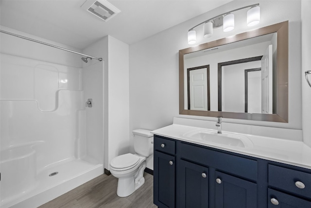 1921 Bowstring Dr, Marion, IA 52302 - bathroom with wood finished floors, vanity, and a shower