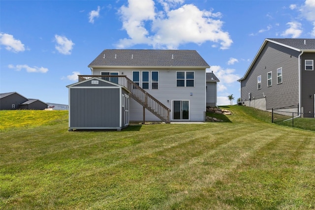 1921 Bowstring Dr, Marion, IA 52302 - back of property featuring stairs, a yard, and a storage unit