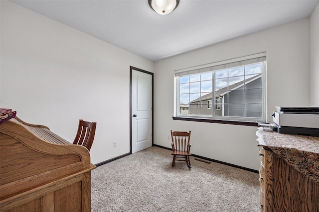 121 Woodstone Ln SW, Cedar Rapids, IA 52404 - office area with light carpet and baseboards