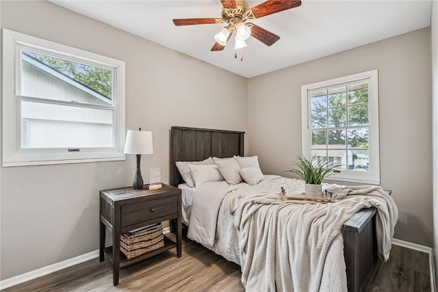 6808 Kelburn Ln NE, Cedar Rapids, IA 52402 - bedroom with wood finished floors and a ceiling fan