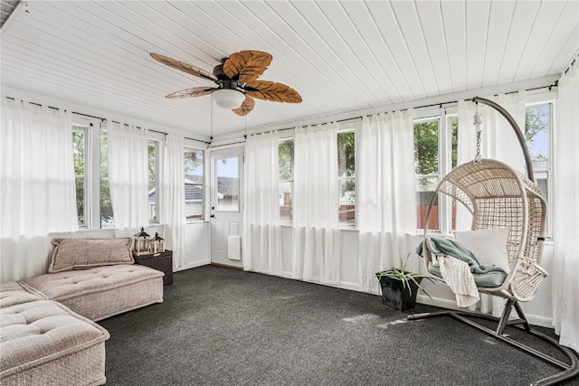 6808 Kelburn Ln NE, Cedar Rapids, IA 52402 - sunroom / solarium featuring wood ceiling, healthy amount of natural light, and carpet floors