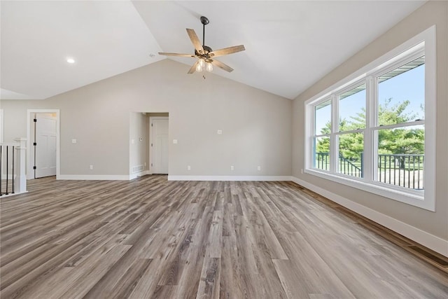 468 Chamber Dr, Anamosa, IA 52205 - unfurnished living room with a ceiling fan, light wood-type flooring, and vaulted ceiling