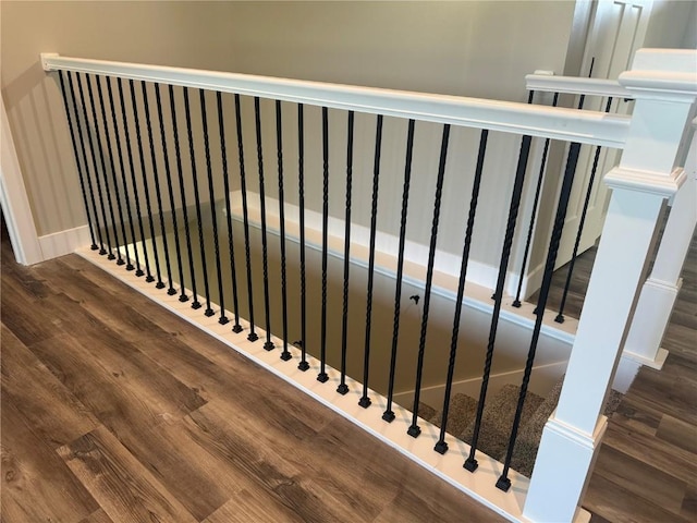 468 Chamber Dr, Anamosa, IA 52205 - stairway with wood finished floors and radiator heating unit