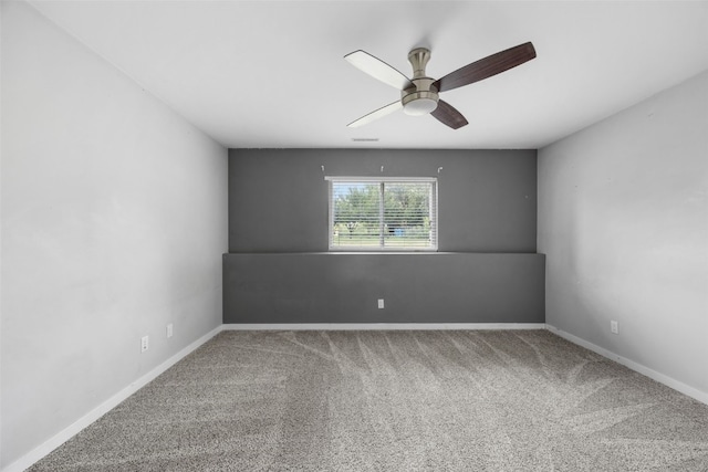 4310 Carpenter Rd NE, Cedar Rapids, IA 52411 - carpeted spare room featuring ceiling fan and baseboards