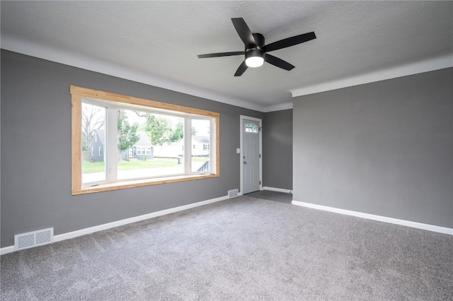 446 19th NW, Cedar Rapids, IA 52405 - carpeted spare room with a ceiling fan and baseboards