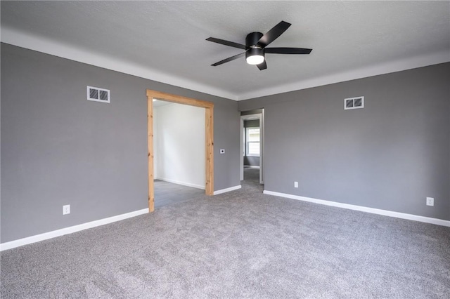 446 19th NW, Cedar Rapids, IA 52405 - empty room with a ceiling fan and carpet flooring
