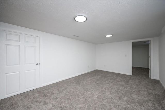 446 19th NW, Cedar Rapids, IA 52405 - finished below grade area featuring carpet floors and a textured ceiling