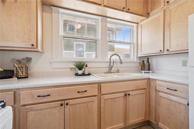 395 18th St SE, Cedar Rapids, IA 52403 - kitchen featuring light brown cabinets and light countertops