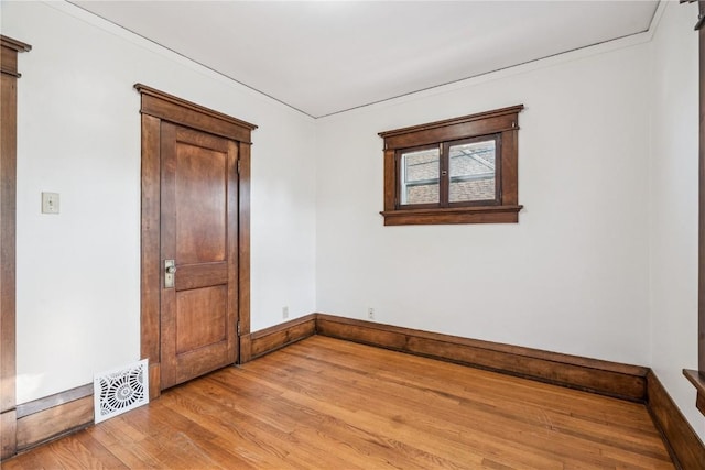 395 18th St SE, Cedar Rapids, IA 52403 - spare room featuring light wood finished floors and baseboards