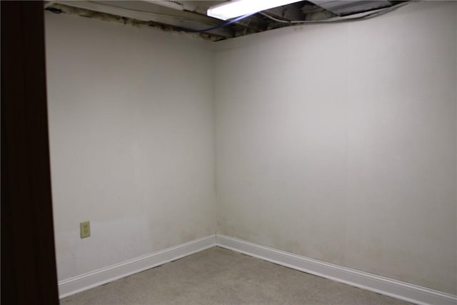 302 S Main St, Monticello, IA 52310 - finished below grade area with carpet floors and baseboards