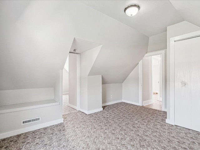 226 2nd Ave E, Lisbon, IA 52253 - bonus room featuring lofted ceiling and carpet floors