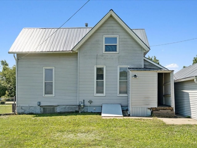 226 2nd Ave E, Lisbon, IA 52253 - rear view of property featuring a metal roof