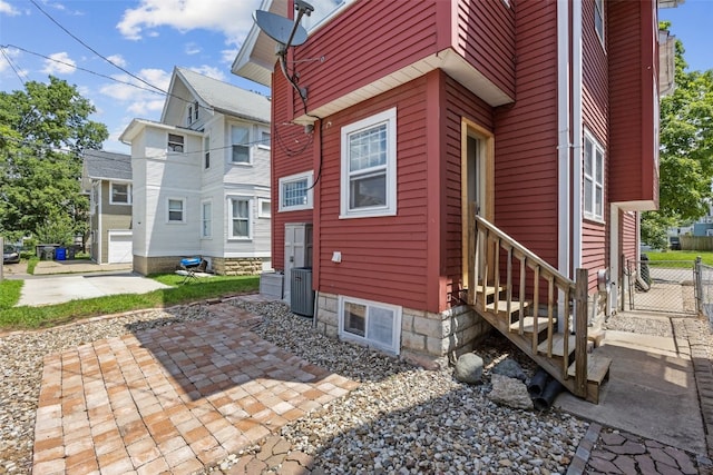 351 19th St SE, Cedar Rapids, IA 52403 - view of side of property featuring entry steps