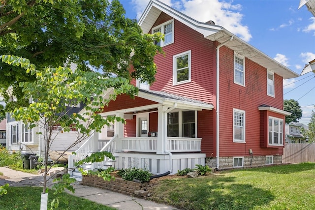 351 19th St SE, Cedar Rapids, IA 52403 - view of front of home with covered porch and a front lawn