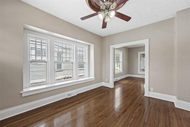 351 19th St SE, Cedar Rapids, IA 52403 - unfurnished room with wood finished floors, ceiling fan, and a textured ceiling