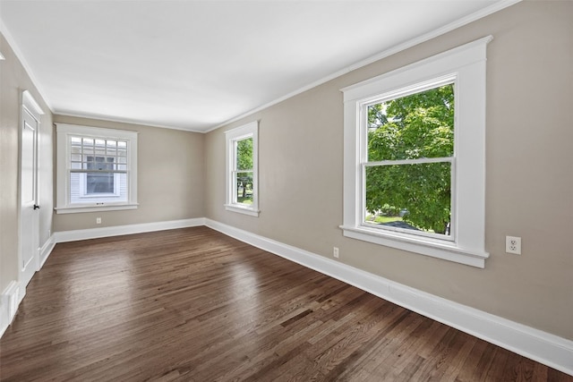 351 19th St SE, Cedar Rapids, IA 52403 - empty room with dark wood-type flooring and ornamental molding